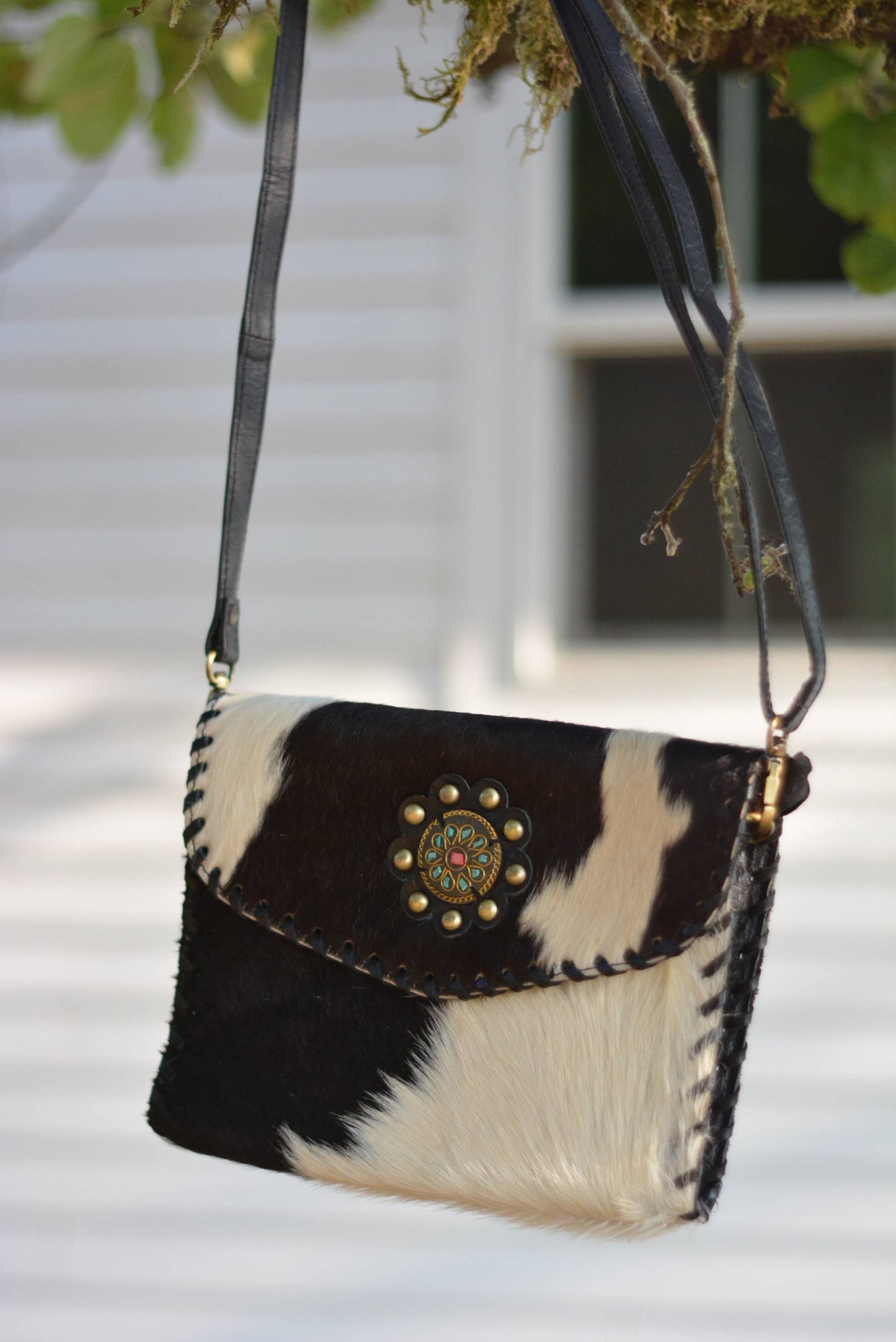 Cowhide Crossbody Bag with Concho Detail
: Brown