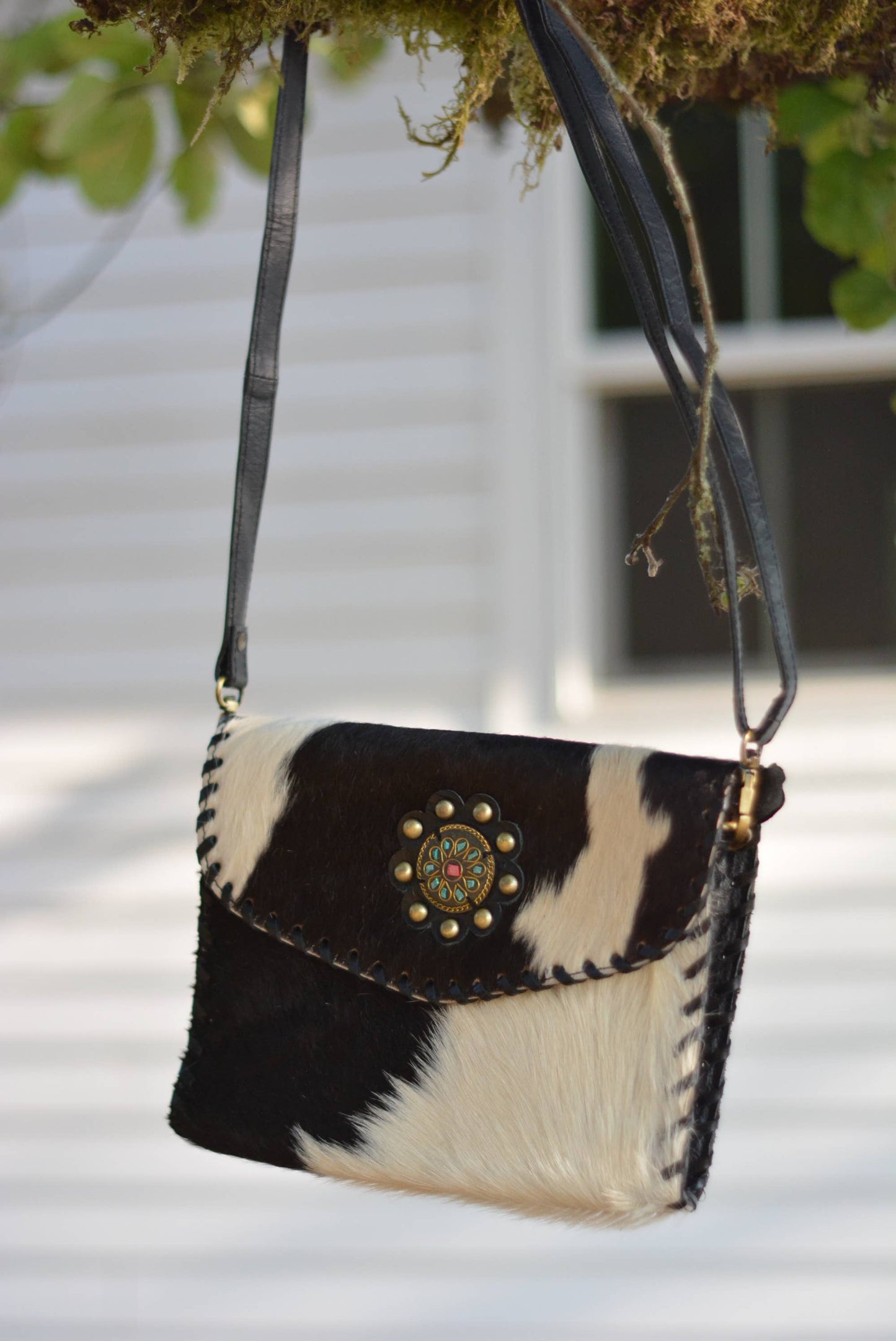 Cowhide Crossbody Bag with Concho Detail
: Brown