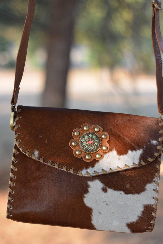 Cowhide Crossbody Bag with Concho Detail
: Brown