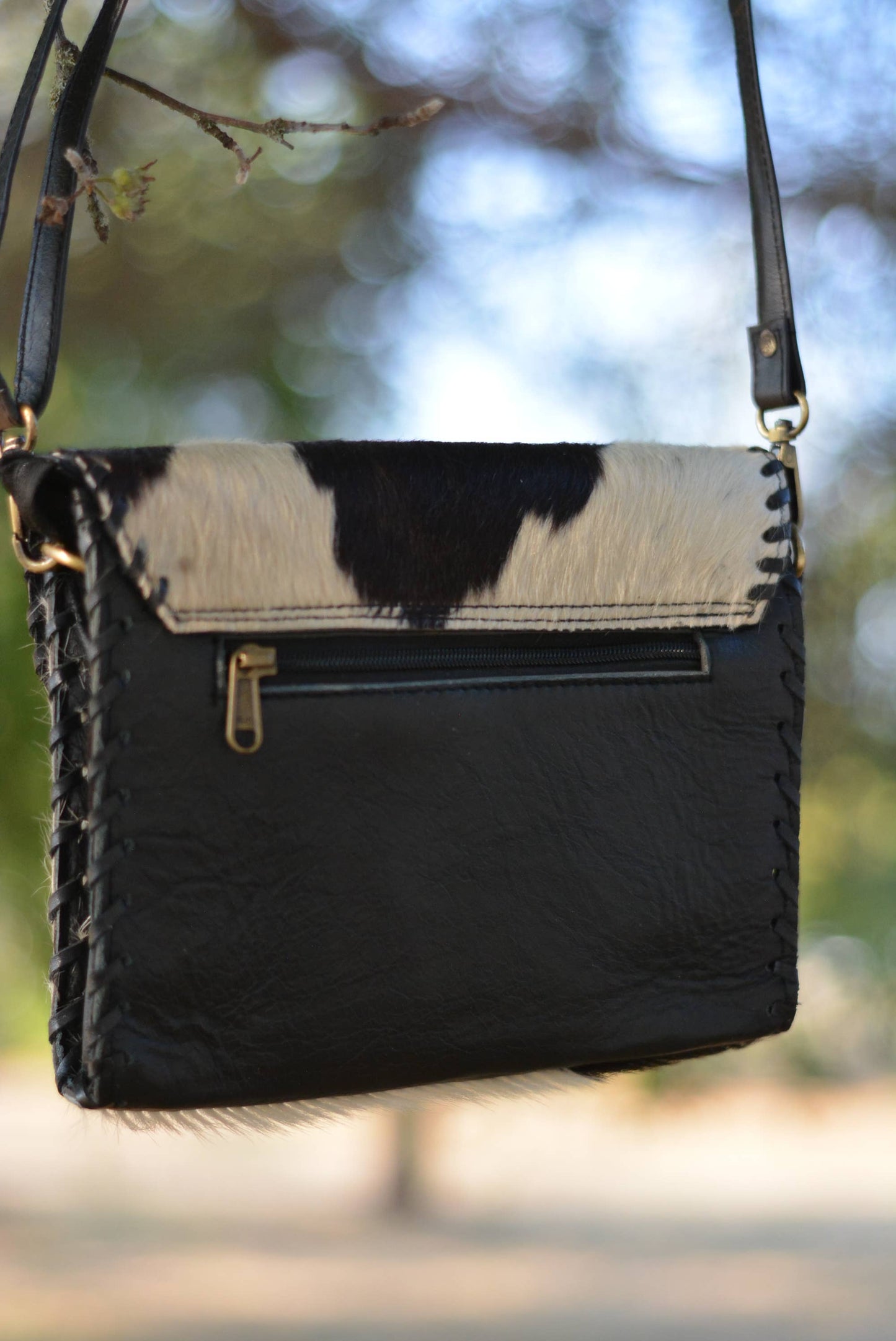 Cowhide Crossbody Bag with Concho Detail
: Brown